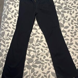 Solid black Levi jeans, straight legged, gently used